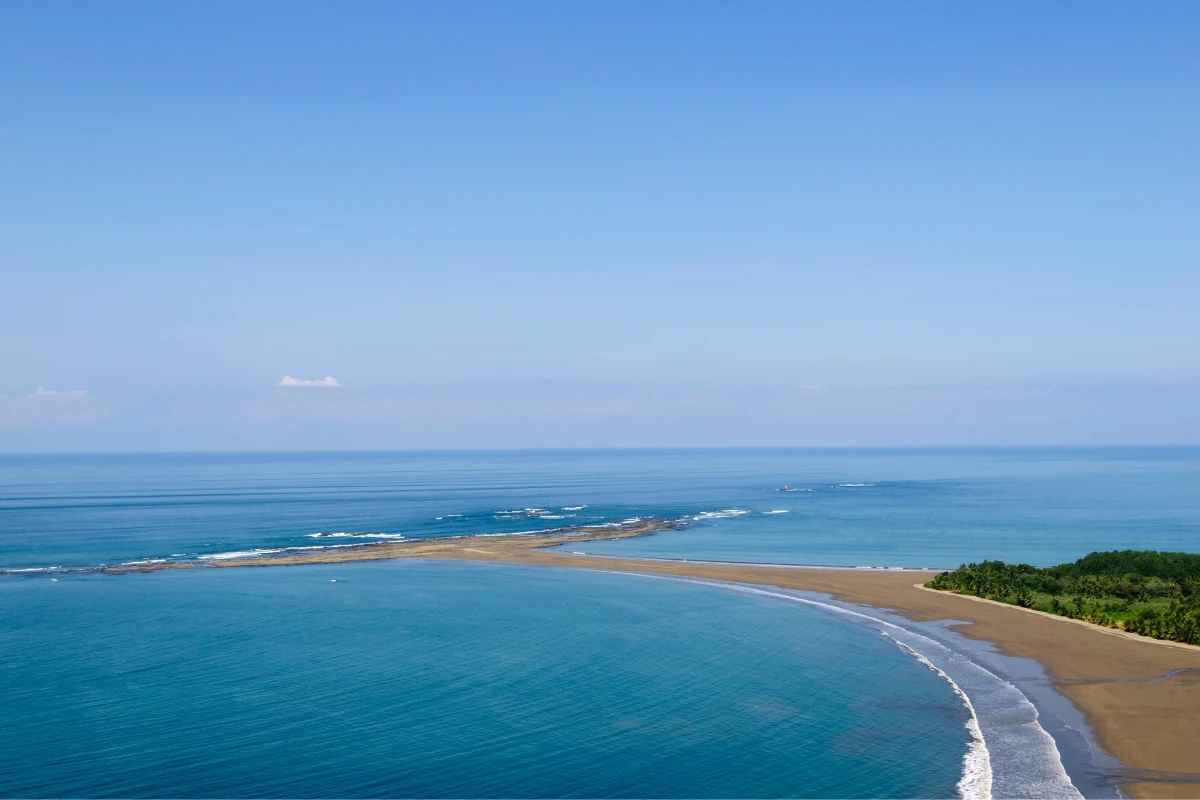 Aerial view of pristine Costa Rican beach with turquoise ocean waters